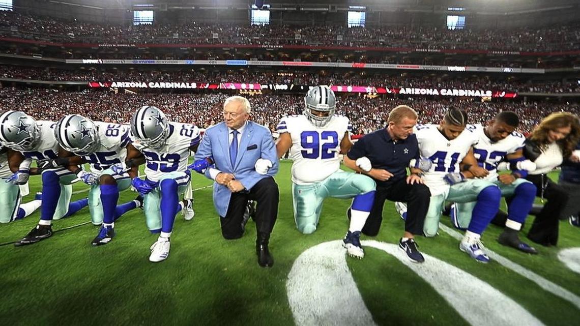 Jerry Jones knelt with the Cowboys before the national anthem on Sept. 25, but he issued a mandate Sunday saying that he will bench any player who disrespects the flag or anthem.