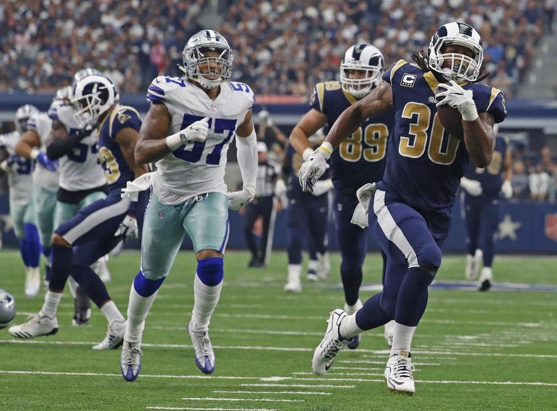Los Angeles Rams running back Todd Gurley (30) leaves the Cowboys defense behind as he runs for a third quarter touchdown on Oct. 1 at AT&T Stadium.