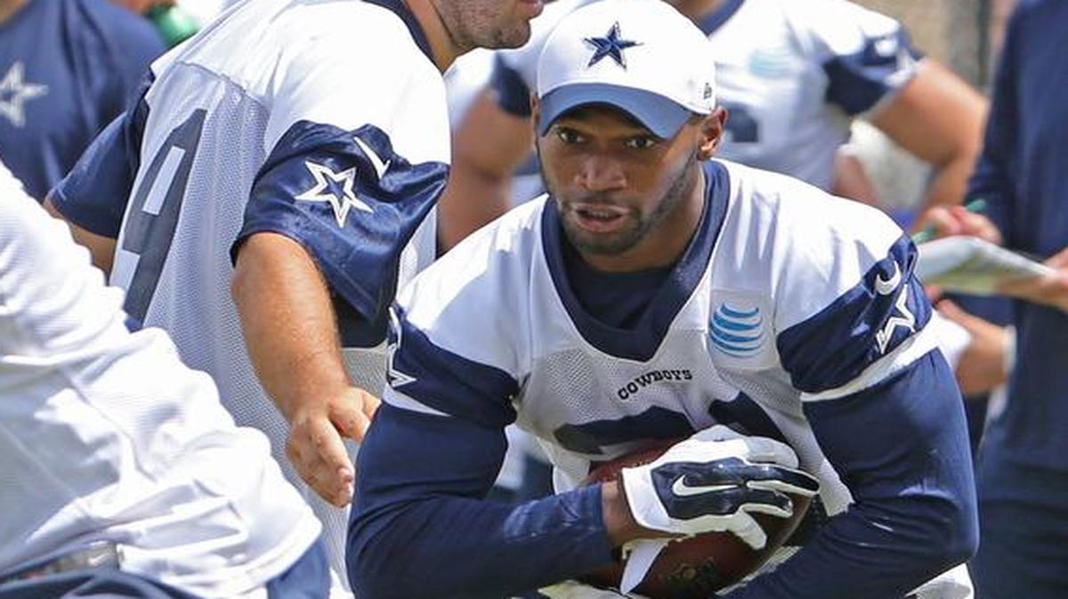 
Joseph Randle looked fast going through holes in the first padded practice Saturday. Star-Telegram/Paul Moseley
