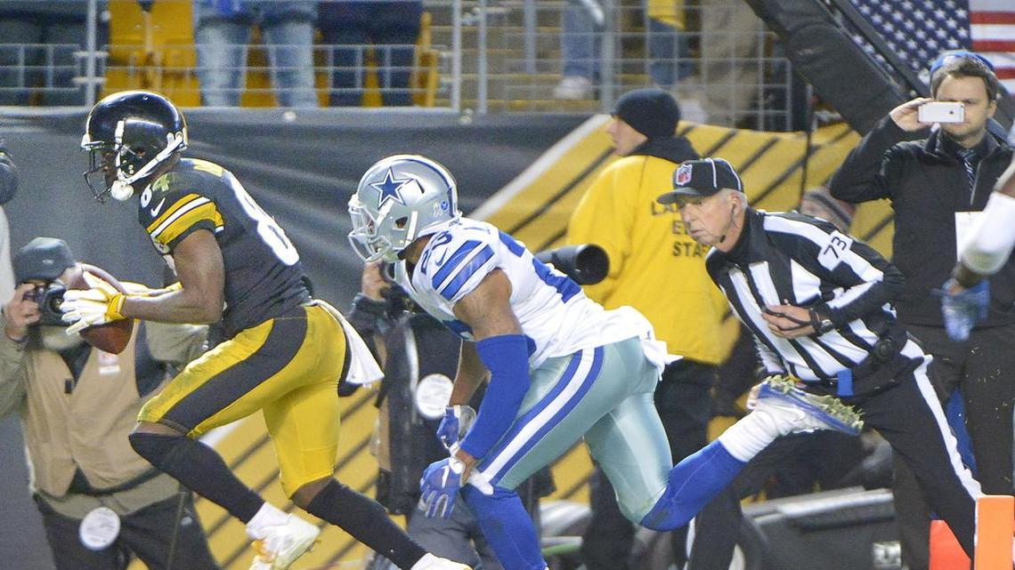 Pittsburgh wide receiver Antonio Brown beats Dallas backup cornerback Leon McFadden on a fourth-quarter touchdown catch off a fake spike from quarterback Ben Roethlisberger with 42 seconds left in the game. The Cowboys rallied to win 35-30.