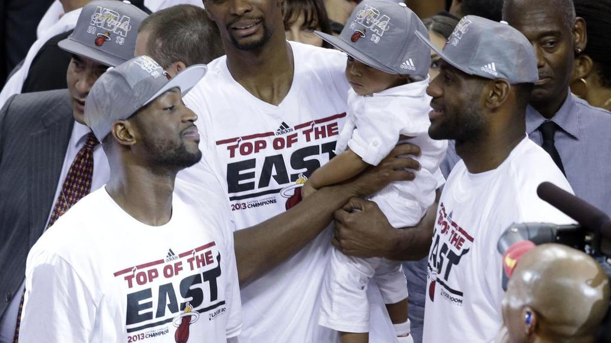 
Chris Bosh, center, has won two NBA titles with the Miami Heat.

