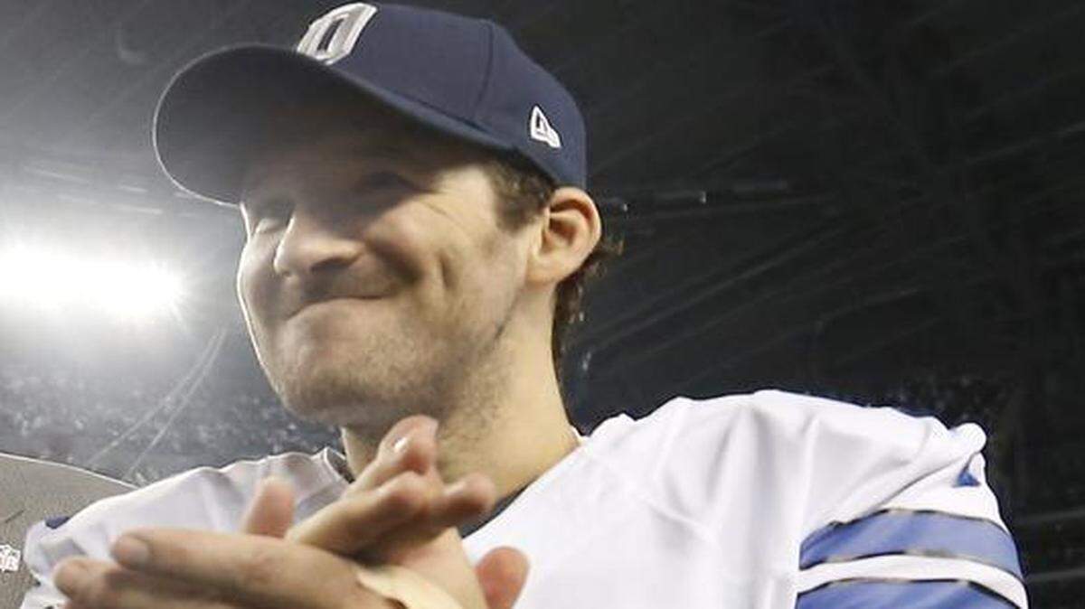 
Dallas Cowboys quarterback Tony Romo celebrates after the team’s playoff victory over the Detroit Lions.
