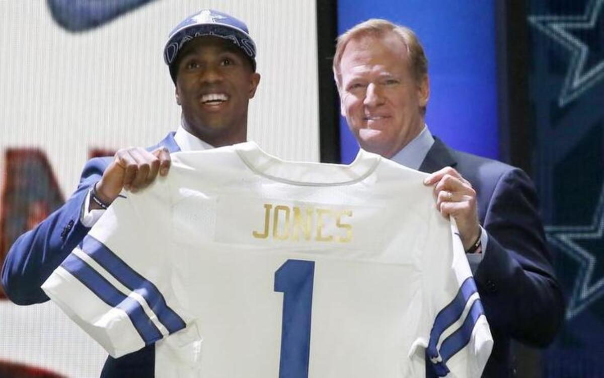 
Connecticut defensive back Byron Jones poses for photos with NFL commissioner Roger Goodell.


