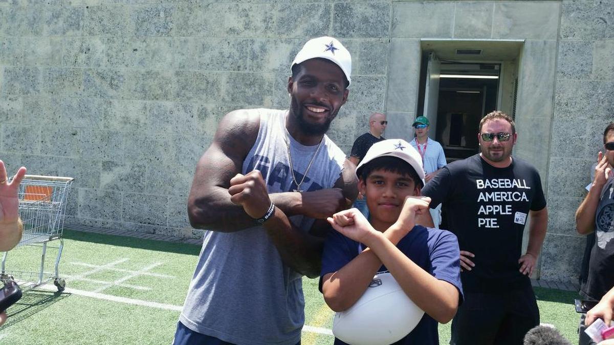 Dallas Cowboys wide receiver Dez Bryant and Scripps Howard National Spelling Bee co-champion Nihar Janga of Austin met during Wednesday’s practice at Valley Ranch.