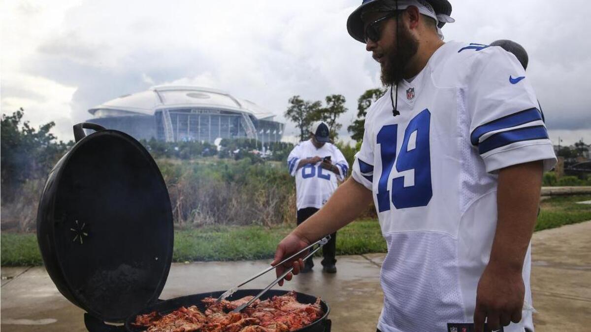 Cowboys fans, like Charles Chalres of Dallas, left AT&T Stadium happy after the game Sunday night.