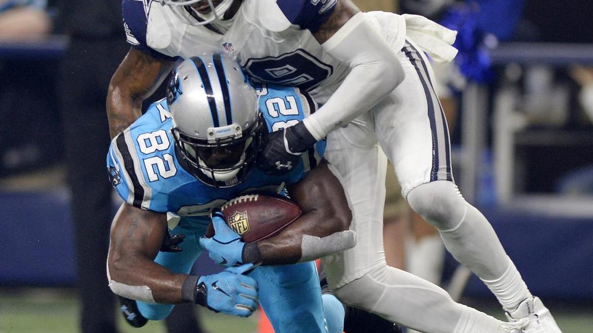 Brandon Carr, shown tackling Carolina receiver Jerricho Cotchery, won the Cowboys’ Man of the Year award.