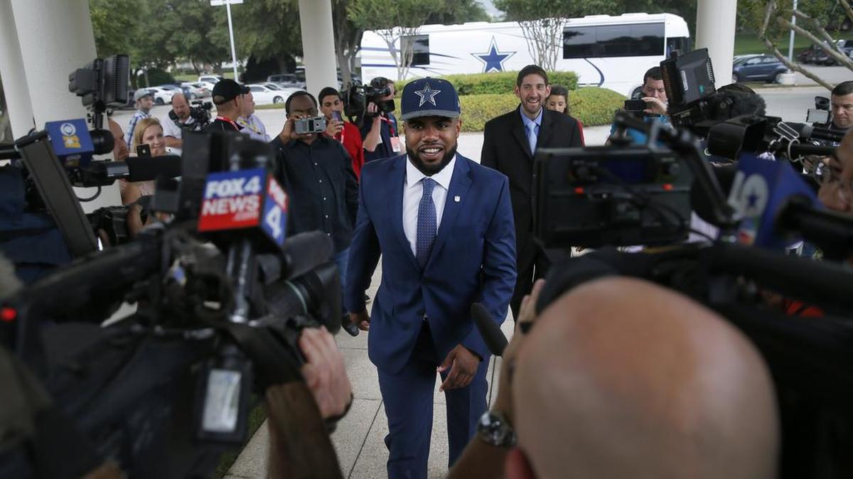 Running back Ezekiel Elliott, center, was the fourth overall pick in the NFL Draft by the Dallas Cowboys.