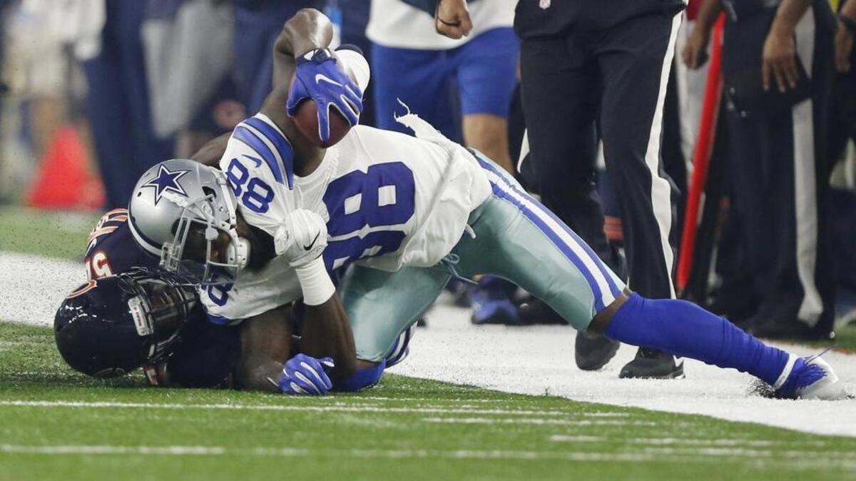 Cowboys receiver Dez Bryant was pulled down awkwardly by Christian Jones, suffering a hairline fracture in his knee.