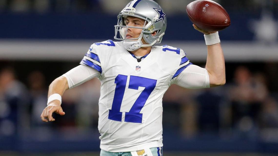 Kellen Moore threw for 158 yards with a touchdown and three interceptions in his debut.