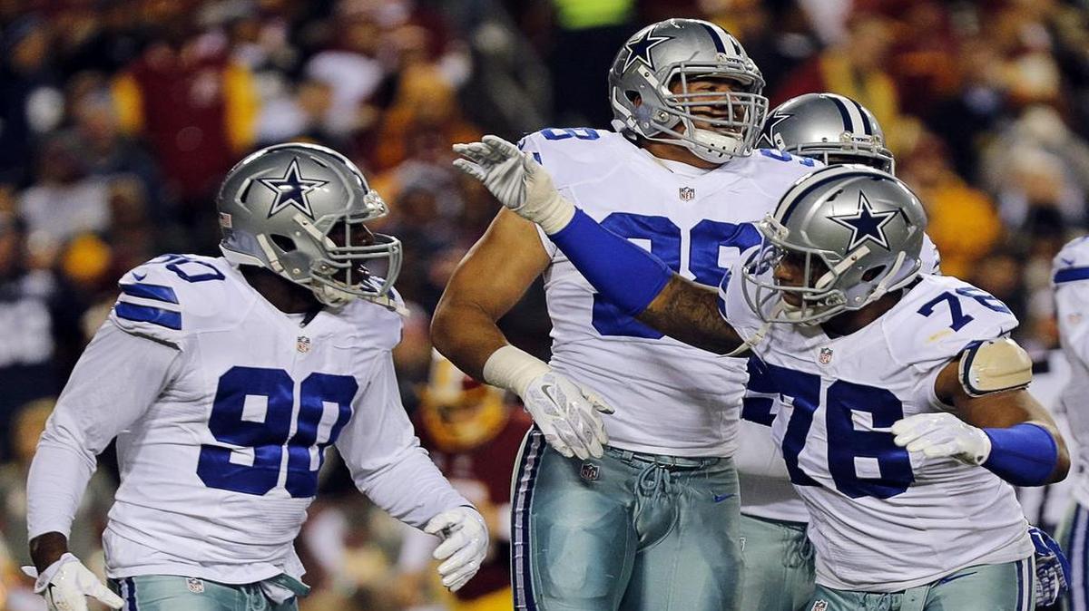Owner Jerry Jones says Greg Hardy’s stats have gone done, but his play has helped his teammates such as DeMarcus Lawrence, left, make a bigger impact.