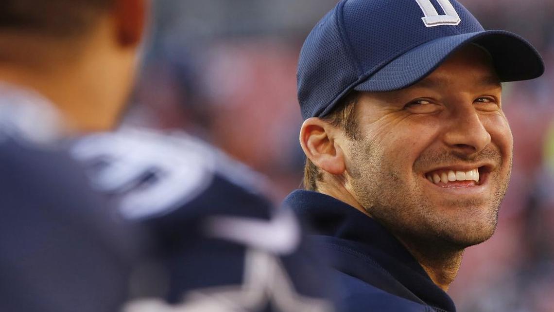 Former Dallas Cowboys quarterback Tony Romo grins during the closing moments as the Dallas Cowboys defeat the Cleveland Browns in Nov. 2016.