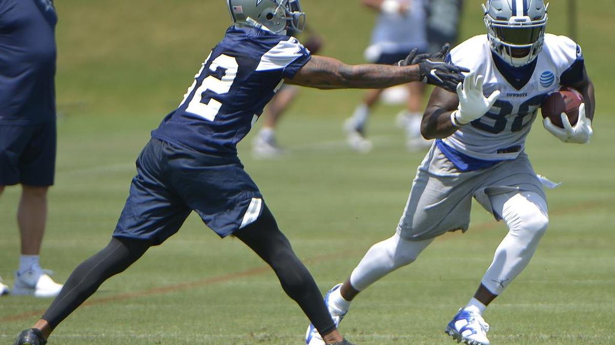 Dallas Cowboys cornerback Orlando Scandrick (32) tries to cover wide receiver Dez Bryant (88) during the Cowboys OTA at Ford Center at The Star in Frisco, TX. A focused Bryant is not concerned about recent comments from Washington Redskins cornerback Josh Norman.