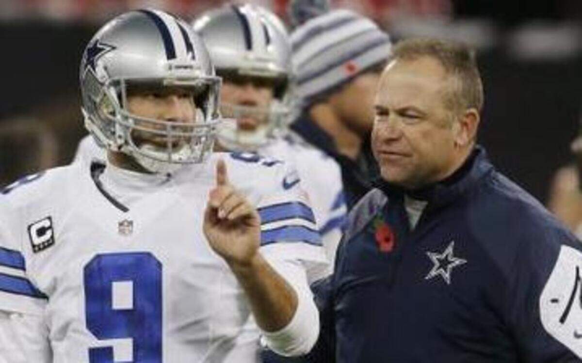 
Former Detroit Lions assistant Scott Linehan, right, has helped guide Tony Romo to the best season of his career after taking over the play-calling duties for the Cowboys. 
