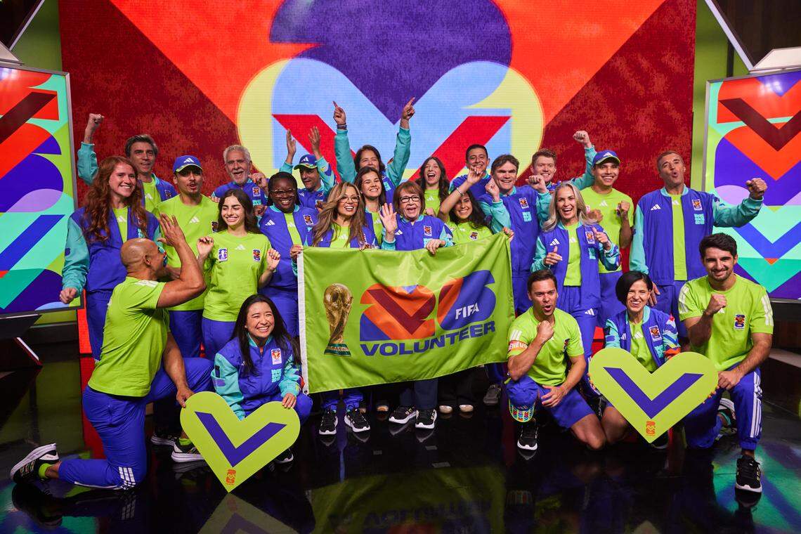 FIFA World Cup volunteers show off their uniforms in a handout photo.