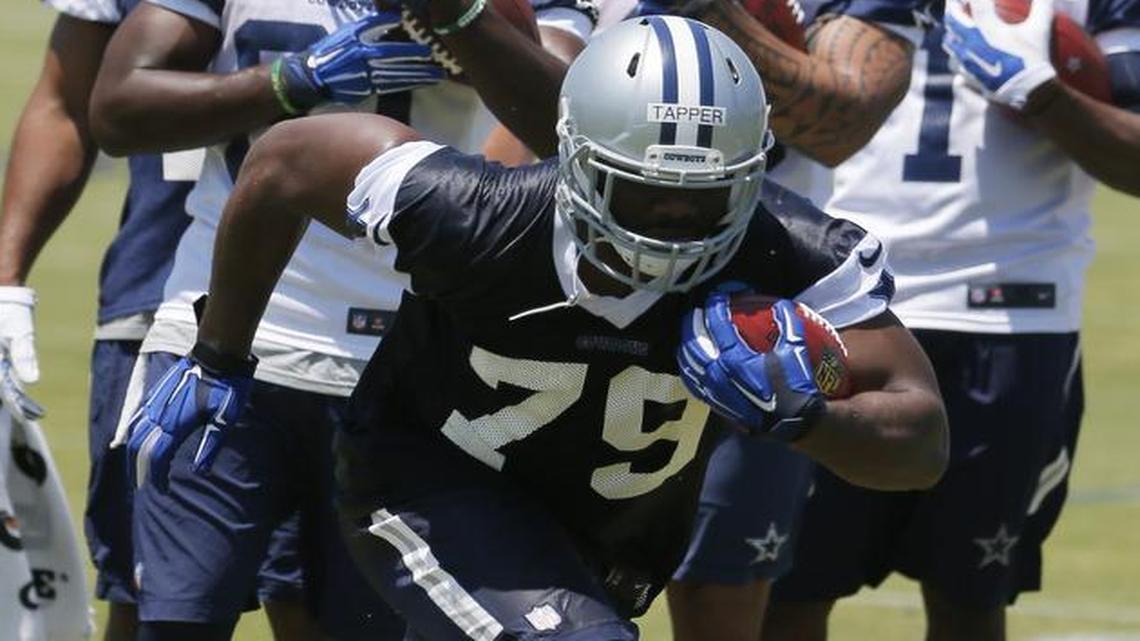 Cowboys rookie defensive end Charles Tapper, a third-round draft pick from Oklahoma, takes part in rookie minicamp on Saturday.