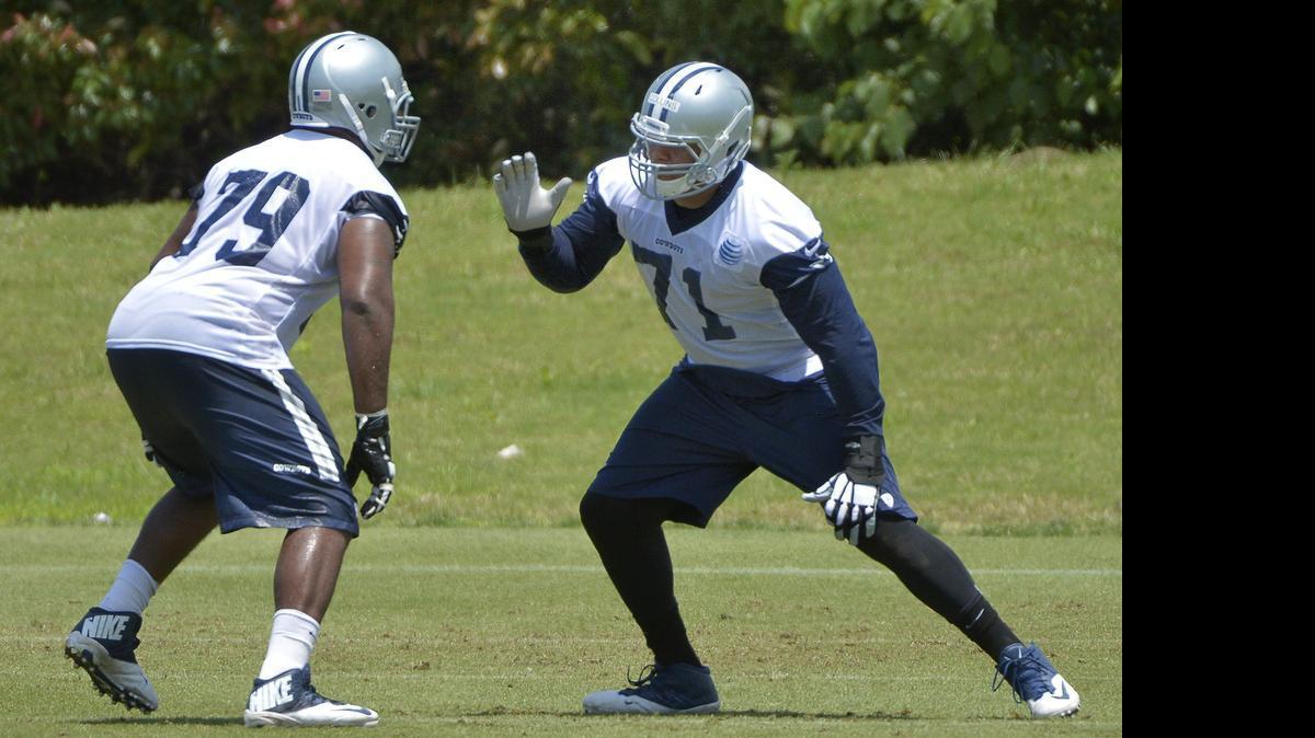 
La'el Collins (71) works with fellow rookie OT Chaz Green (79) during an OTA practice at Valley Ranch on Wednesday. 
