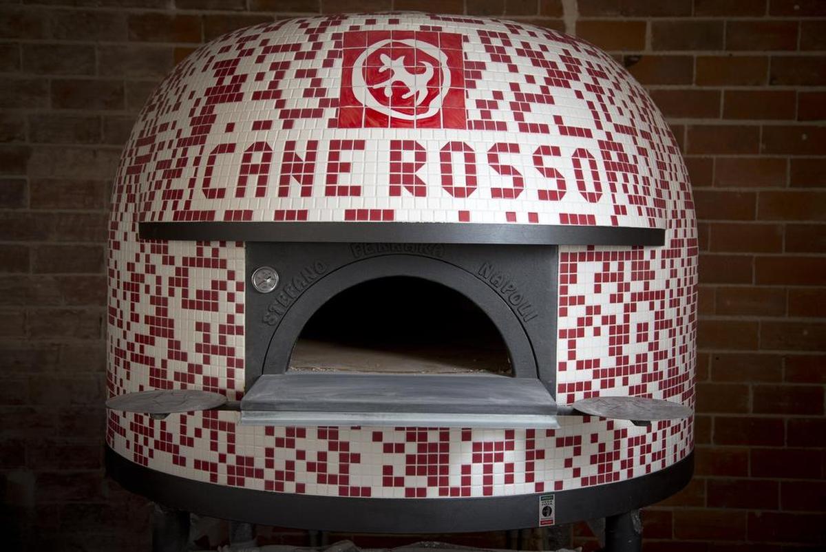 Cane Rosso’s brick oven.