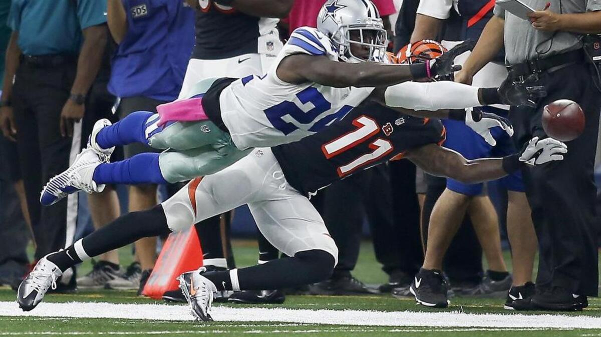 Dallas Cowboys cornerback Morris Claiborne (24) defends a pass intended for Cincinnati Bengals wide receiver Brandon LaFell (11) in the first half of an NFL football game at AT&T Stadium in Arlington, Texas on Sunday, Oct. 9, 2016. Dallas won 28-14.