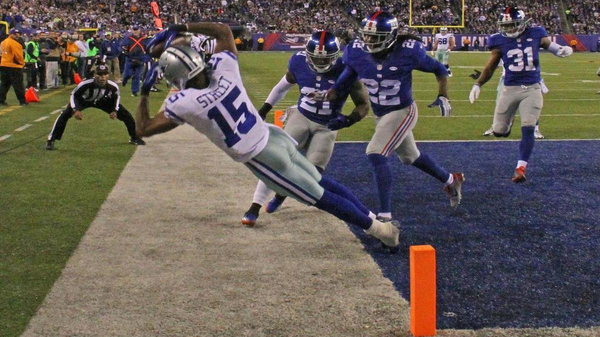Dallas Cowboys wide receiver Devin Street completes a tough, 25-yard touchdown reception against the New York Giants.