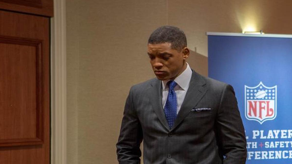 Will Smith stars as Dr. Bennet Omalu in the Columbia Pictures movie Concussion, which hits movie theaters on Christmas Day.