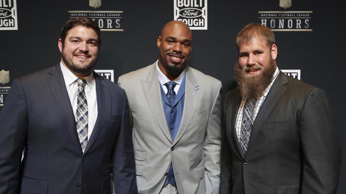 Zack Martin, left, will join offensive line teammates Tyron Smith, center, and Travis Frederick with a big-money deal.