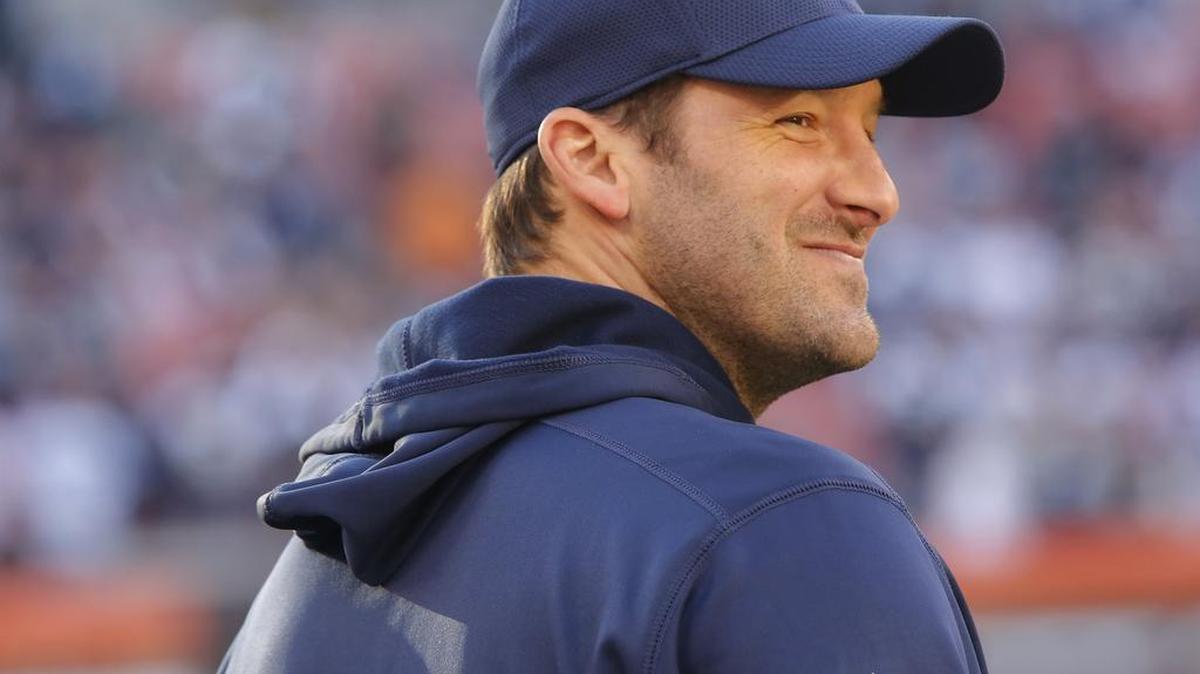 Injured Dallas Cowboys quarterback Tony Romo grins during the closing moments as the Dallas Cowboys defeat the Cleveland Browns 35-10 in FirstEnergy Stadium in Cleveland, Ohio, Sunday, November 6, 2016.