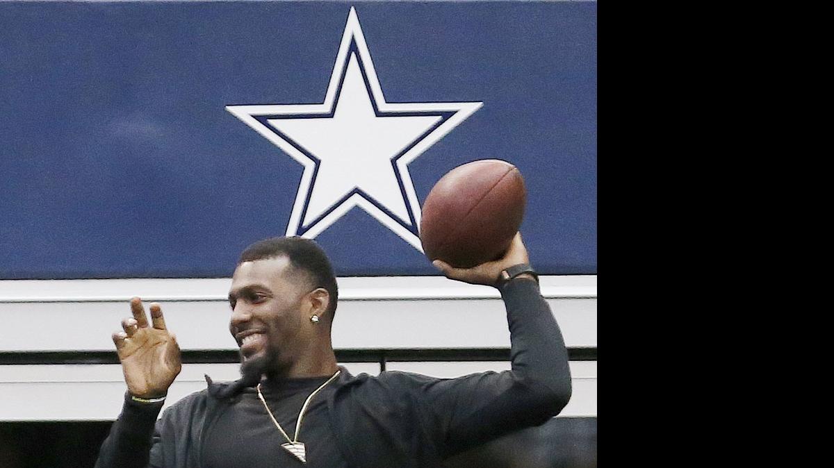 
Dez Bryant, shown during the Cowboys’ final mincamp practice last month, arrived at training camp after signing his new deal July 15.
