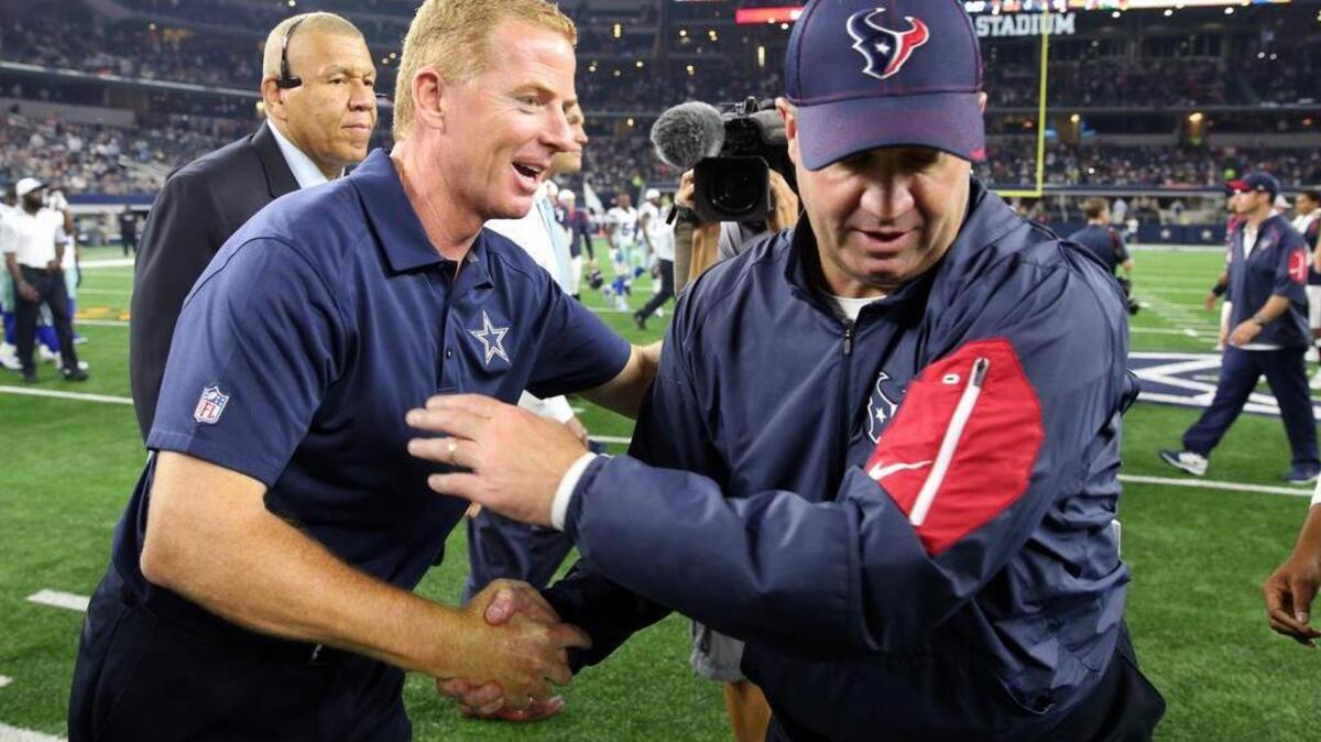 
Dallas Cowboys head coach Jason Garrett shakes hands with Houston Texans head coach Bill O'Brien after the Cowboys 21-14 win in a preseason game at AT&T Stadium Thursday, September 3, 2015 
