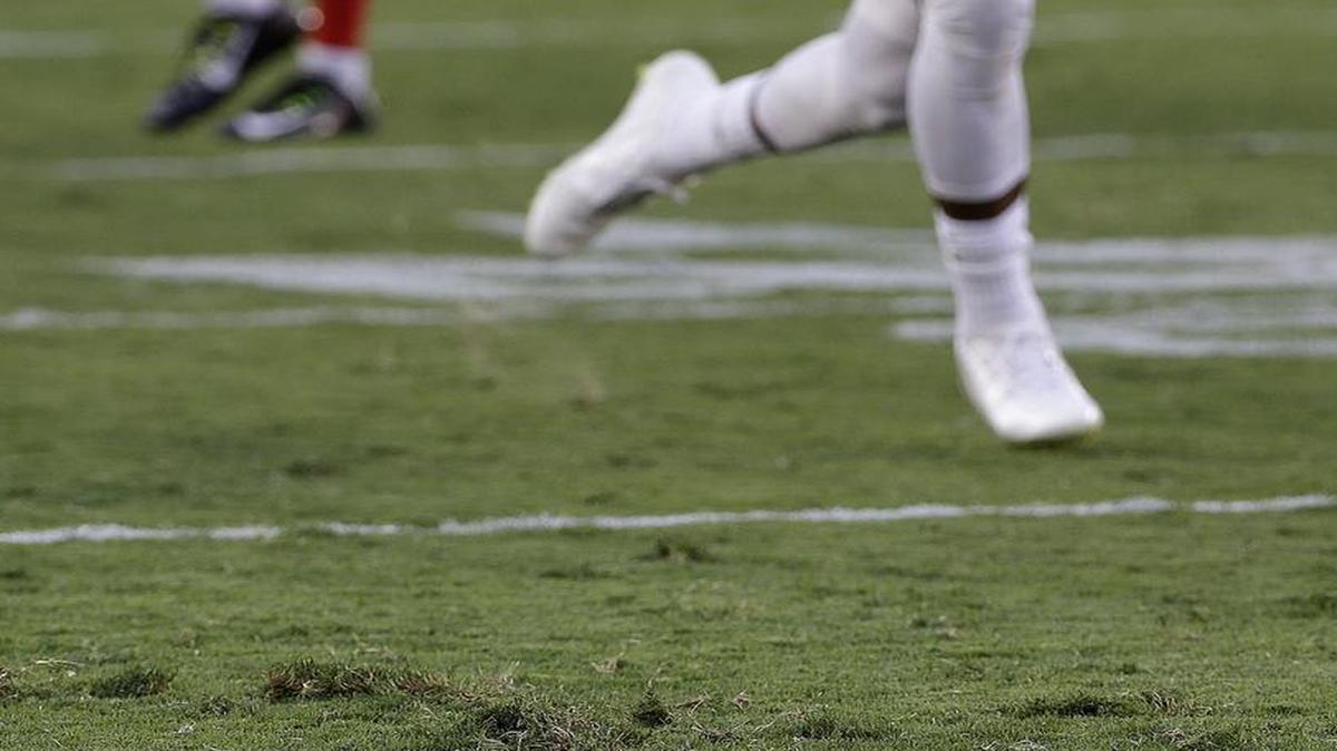 
A San Francisco 49ers player runs on the field at Levi's Stadium during a training camp practice earlier this month.

