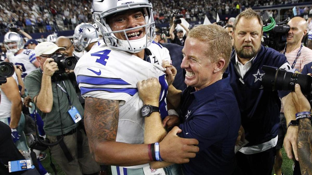 Dallas Cowboys head coach Jason Garrett celebrates with quarterback Dak Prescott (4) after a game winning touchdown pass to tight end Jason Witten, not pictured, in overtime during an NFL football game against the Philadelphia Eagles. They are now betting favorites to reach the Super Bowl.