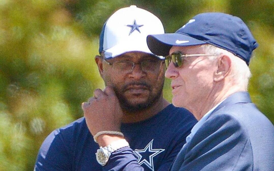 Dallas Cowboys assistant director of player personnel Will McClay talks to owner Jerry Jones at Valley Ranch. McClay helped scout the Cowboys rookie class that includes Dak Prescott and Ezekiel Elliott.