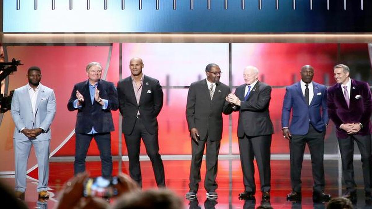 Former NFL players LaDainian Tomlinson, from the left, Morten Andersen, Jason Taylor, Kenny Easley, Jerry Jones, Terrell Davis and Kurt Warner are announced as inductees into the Pro Football Hall of Fame at the 6th annual NFL Honors at the Wortham Center on Saturday, Feb. 4, 2017, in Houston.
