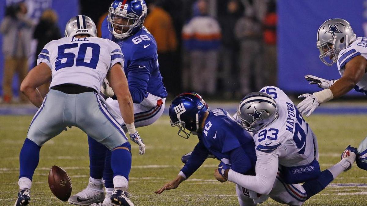 Benson Mayowa (right) had a strip-sack of Eli Manning on Sunday night.