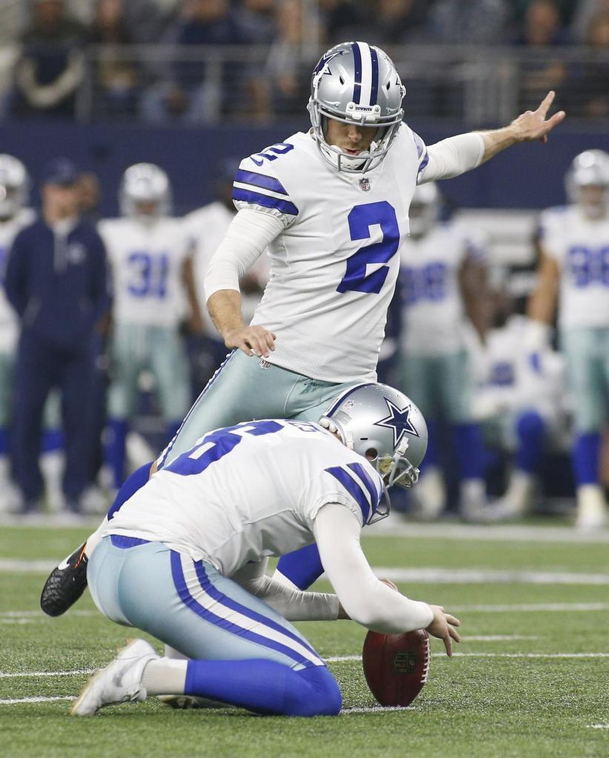 Dallas Cowboys place kicker Mike Nugent (2) kicks his first of three field goals during the first quarter against the Philadelphia Eagles at AT&T Stadium in Arlington on Sunday, November 19.