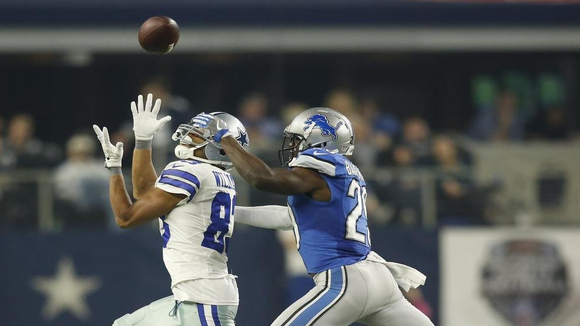 Dallas Cowboys wide receiver Terrance Williams catches a pass over Detroit Lions cornerback Johnson Bademosi.