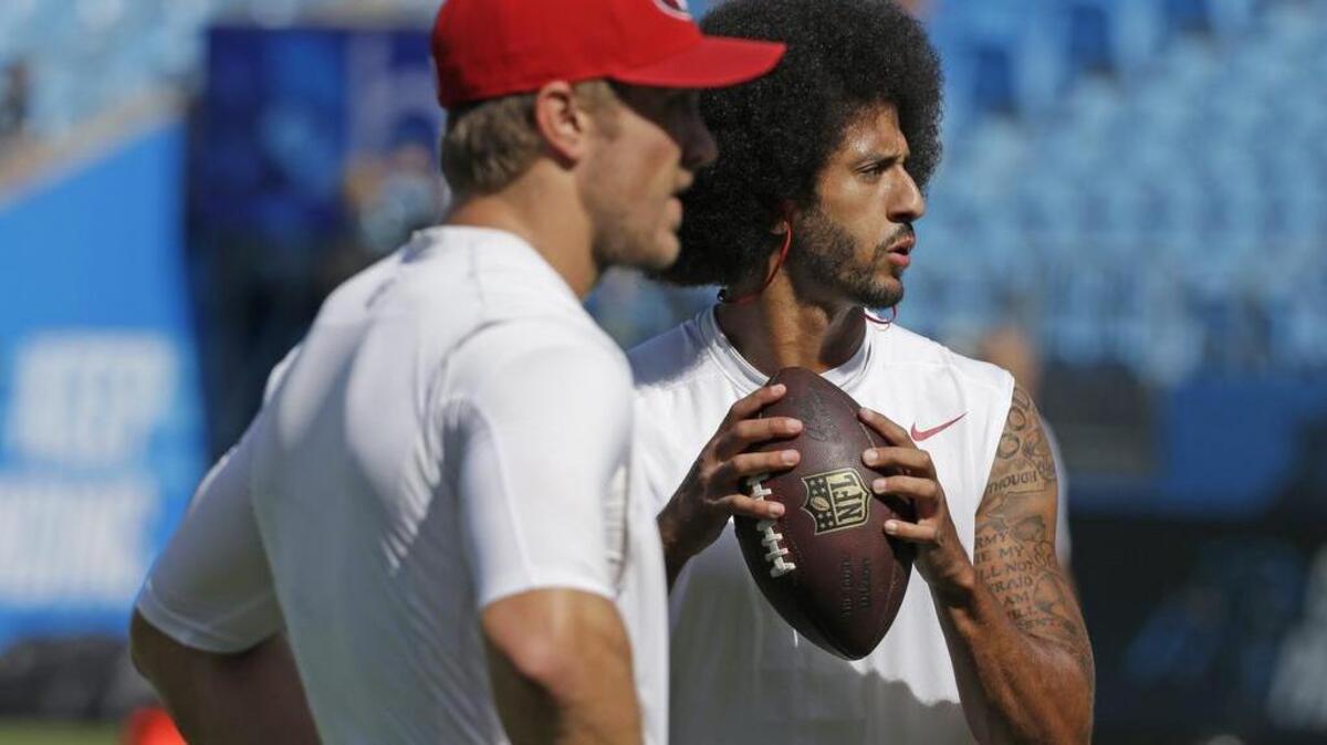 San Francisco quarterbacks Blaine Gabbert, left, and Colin Kaepernick are trying to find ways to spark the Niners offense.