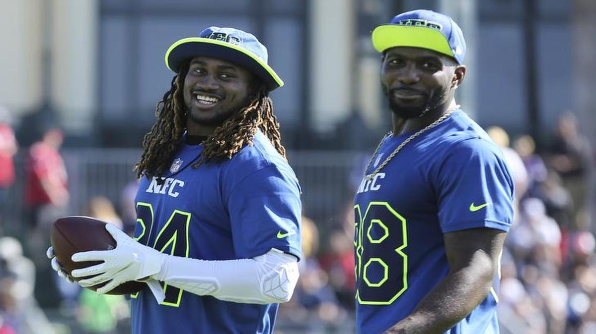 Minnesota Vikings receiver Cordarrelle Patterson, left, and Cowboys receiver Dez Bryant share one of many light moments at Wednesday’s practice for the Pro Bowl on Sunday.