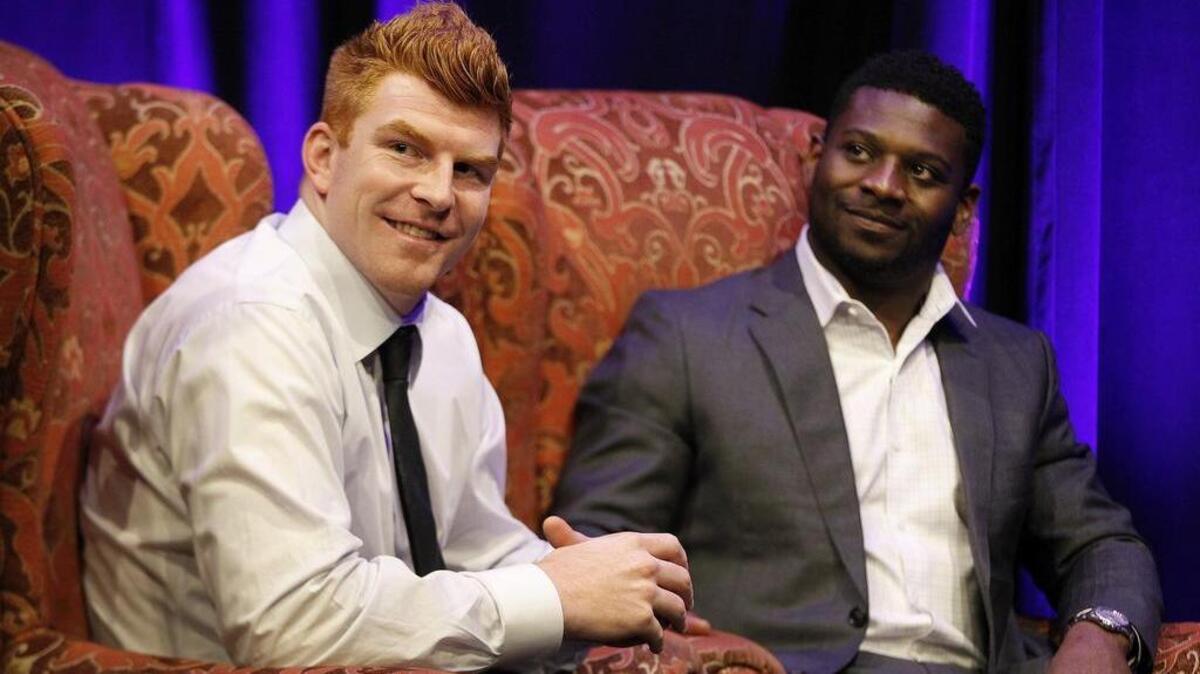 Former TCU greats Andy Dalton, left, and LaDainian Tomlinson were guests at the Meals on Wheels luncheon at the Fort Worth Club on Wednesday.