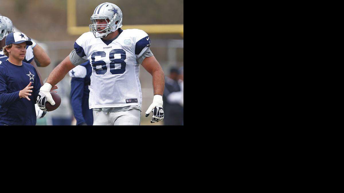 
Cowboys right tackle Doug Free, shown during training camp last year, will return after agreeing to a three-year deal.
