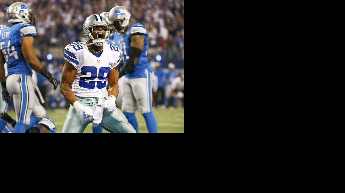 
DeMarco Murray celebrates after scoring on a touchdown run against the Lions in a playoff game in January.
