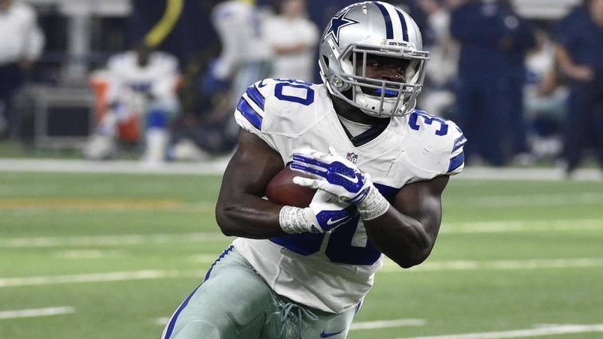 Running back Christine Michael was cut by the Dallas Cowboys Tuesday along with cornerback Corey White.