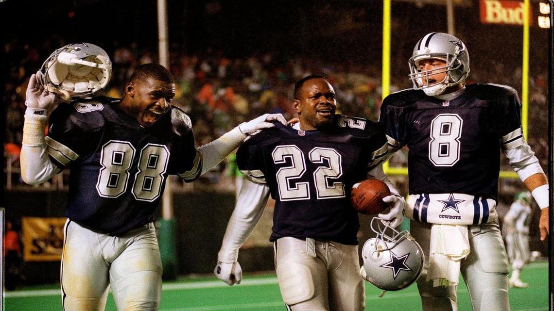 Former Dallas Cowboys running back Emmitt Smith (center), quarterback Troy Aikman, right, and receiver Michael Irvin, left, helped lead the team to three Super Bowl titles in the 1990s.