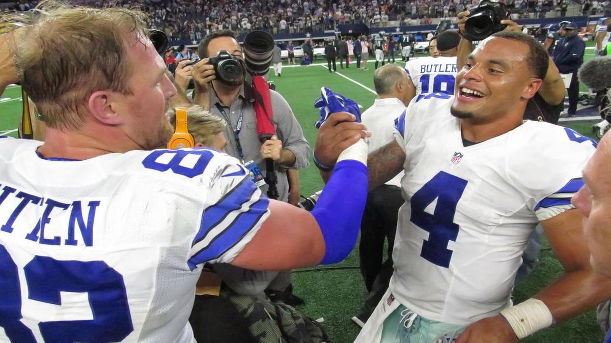 Jason Witten, left, and Dak Prescott teamed up for the game-clinching touchdown pass in overtime.