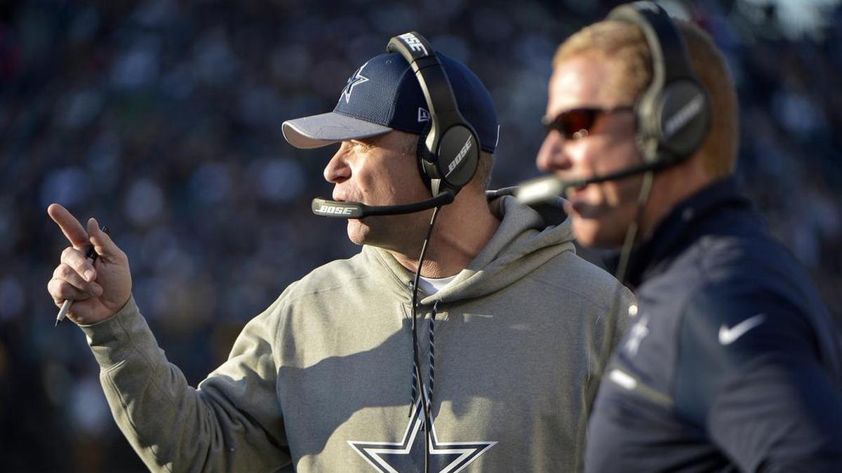 Dallas Cowboys offensive coordinator Scott Linehan, left, has become the subject of intense criticism as his offense is ranked 30th overall in the NFL after three games.
