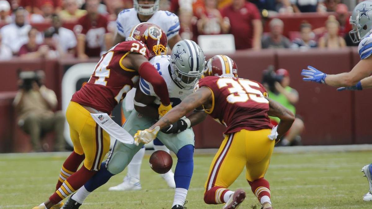 Running back Ezekiel Elliott (21) fumbled against the Redskins in Week 2, but the Cowboys’ ball protection is among the biggest reasons they are 11-1.