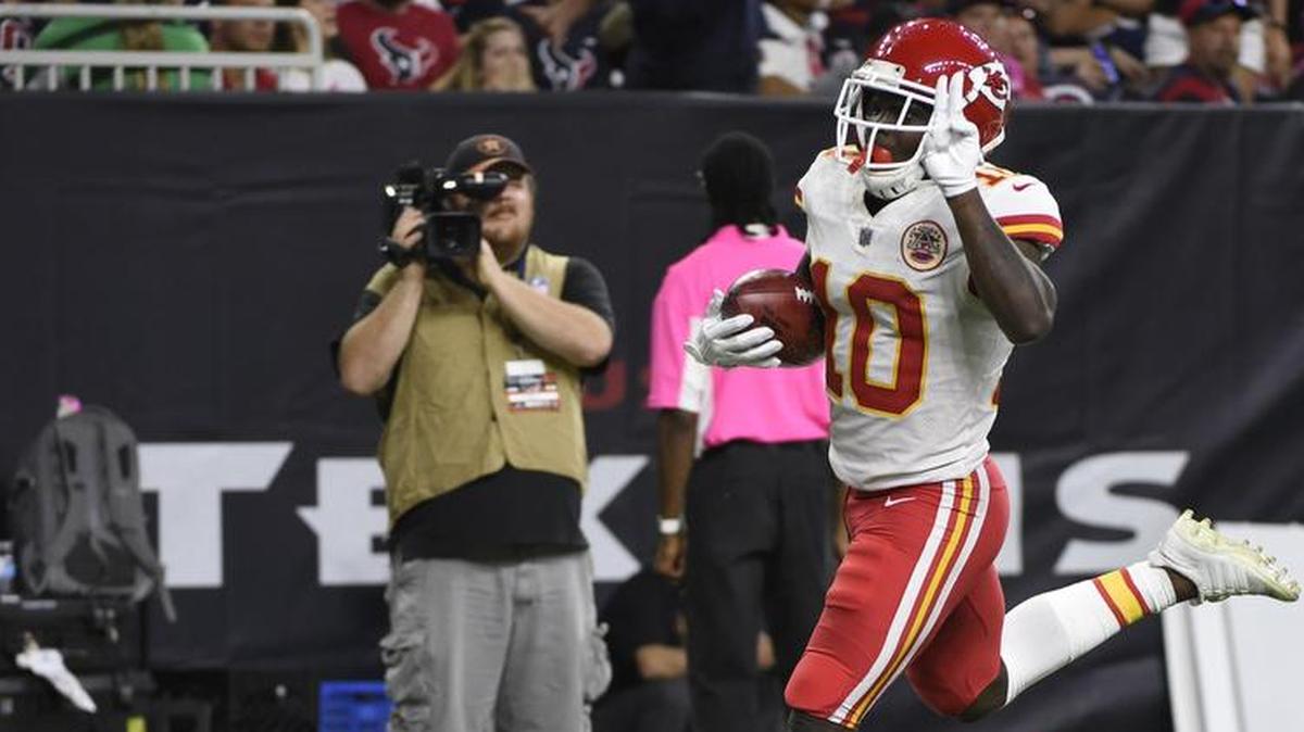 Tyreek Hill scored on a 56-yard pass against the Dallas Cowboys on Sunday.