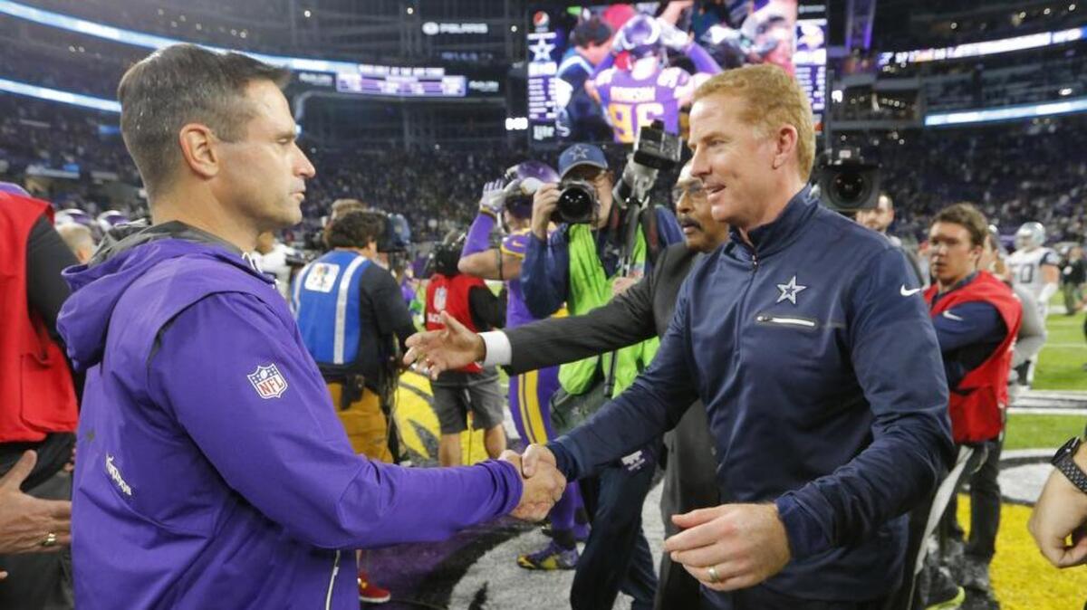 Minnesota Vikings interim coach Mike Priefer and Dallas Cowboys head coach Jason Garrett shake hands after the game as the Dallas Cowboys defeat the Minnesota Vikings 17-15 at U.S. Bank Stadium in Minneapolis on Thursday, December 1, 2016.