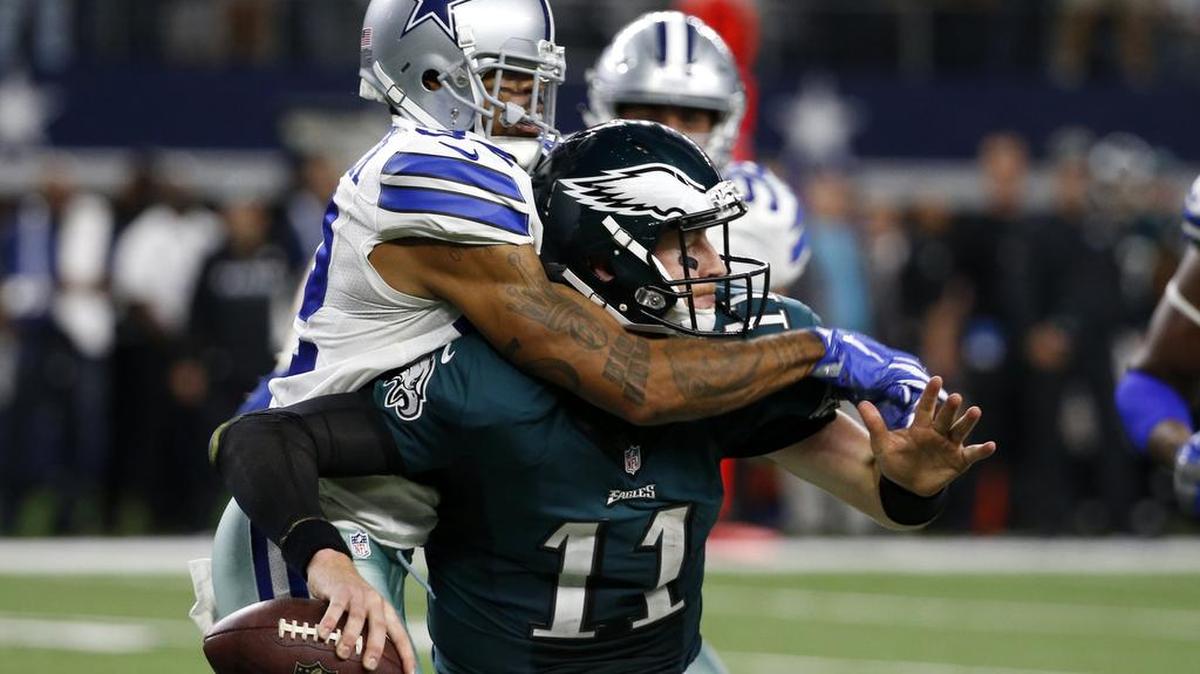 Eagles rookie quarterback Carson Wentz is sacked by Cowboys cornerback Orlando Scandrick.