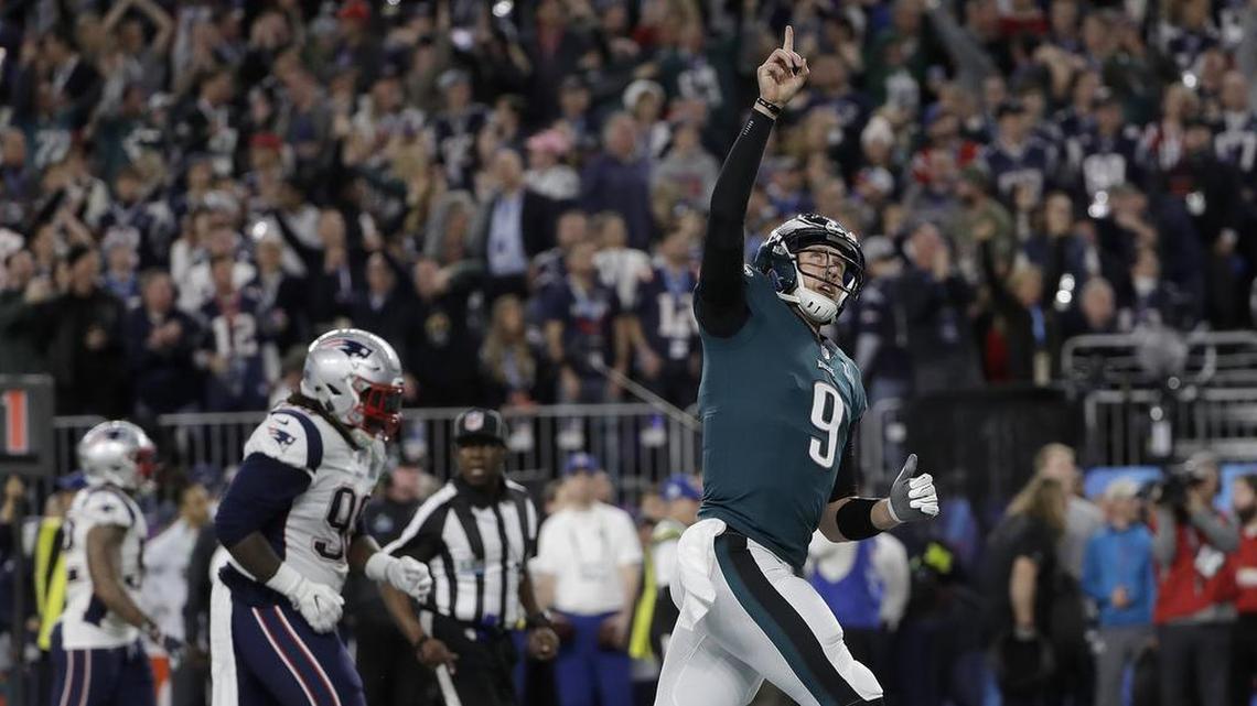 Philadelphia Eagles quarterback Nick Foles celebrates after throwing a touchdown pass to Alshon Jeffery. Foles, who played at Austin Westlake, was named most valuable player after passing for 373 yards and three touchdowns. He also caught a touchdown.