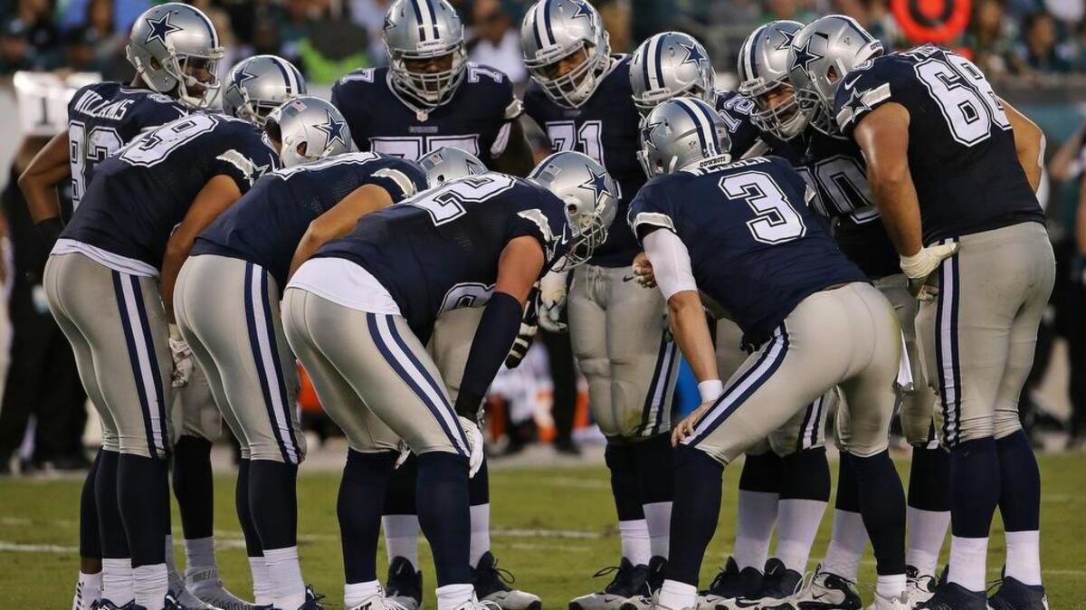 
With Tony Romo injured, Brandon Weeden is running the huddle and the offense.
